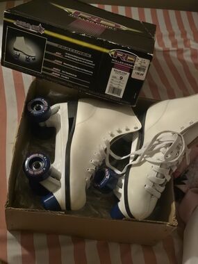 White Kids Quad Roller Skates with Blue Wheels
